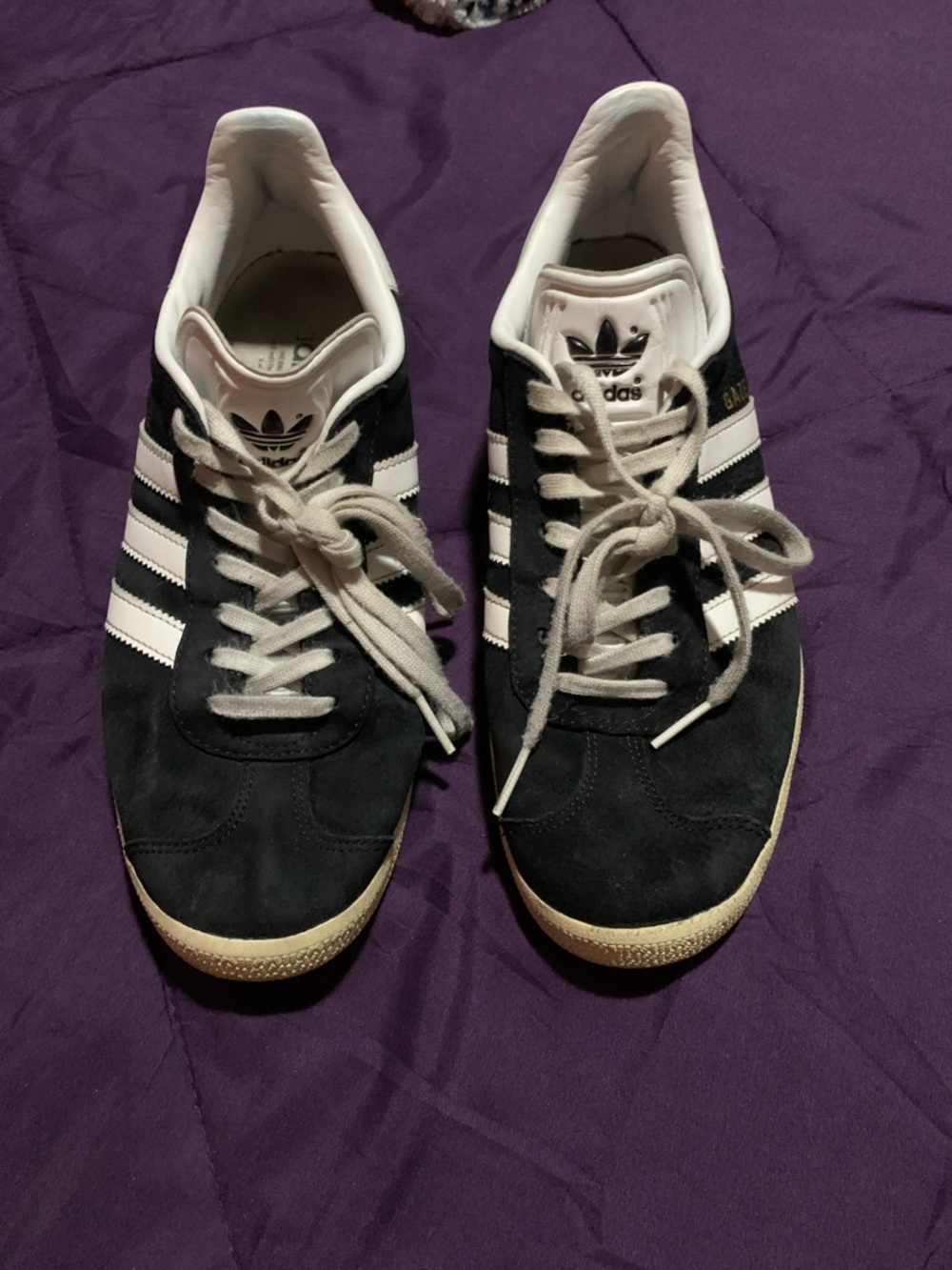 adidas Gazelle sneakers in a classic black and white